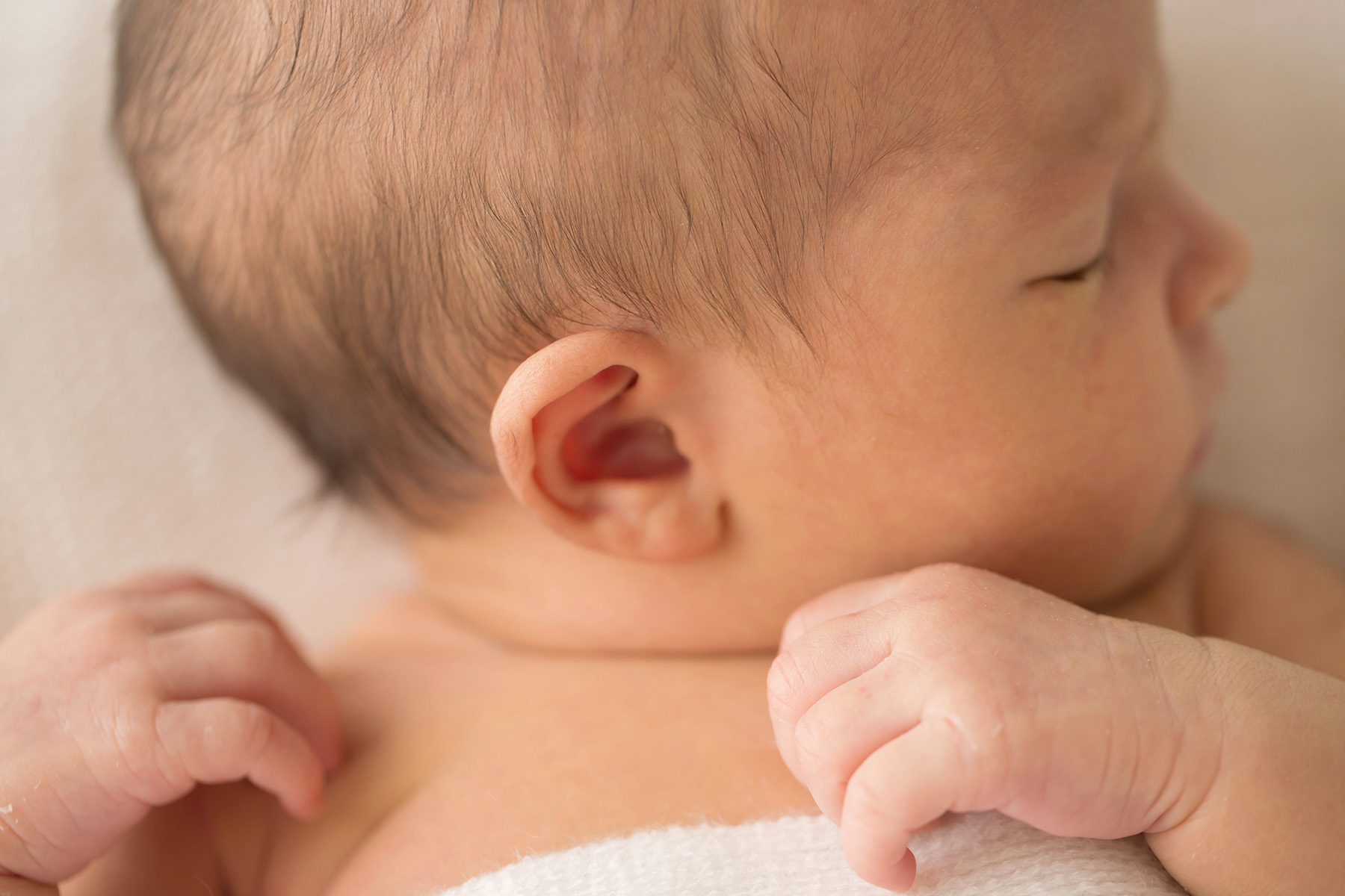 Julie Brock Photography | Louisville Newborn Photographer | Materntiy Photographer | Family Photographer | upclose detail photo of baby hands and ear.jpg