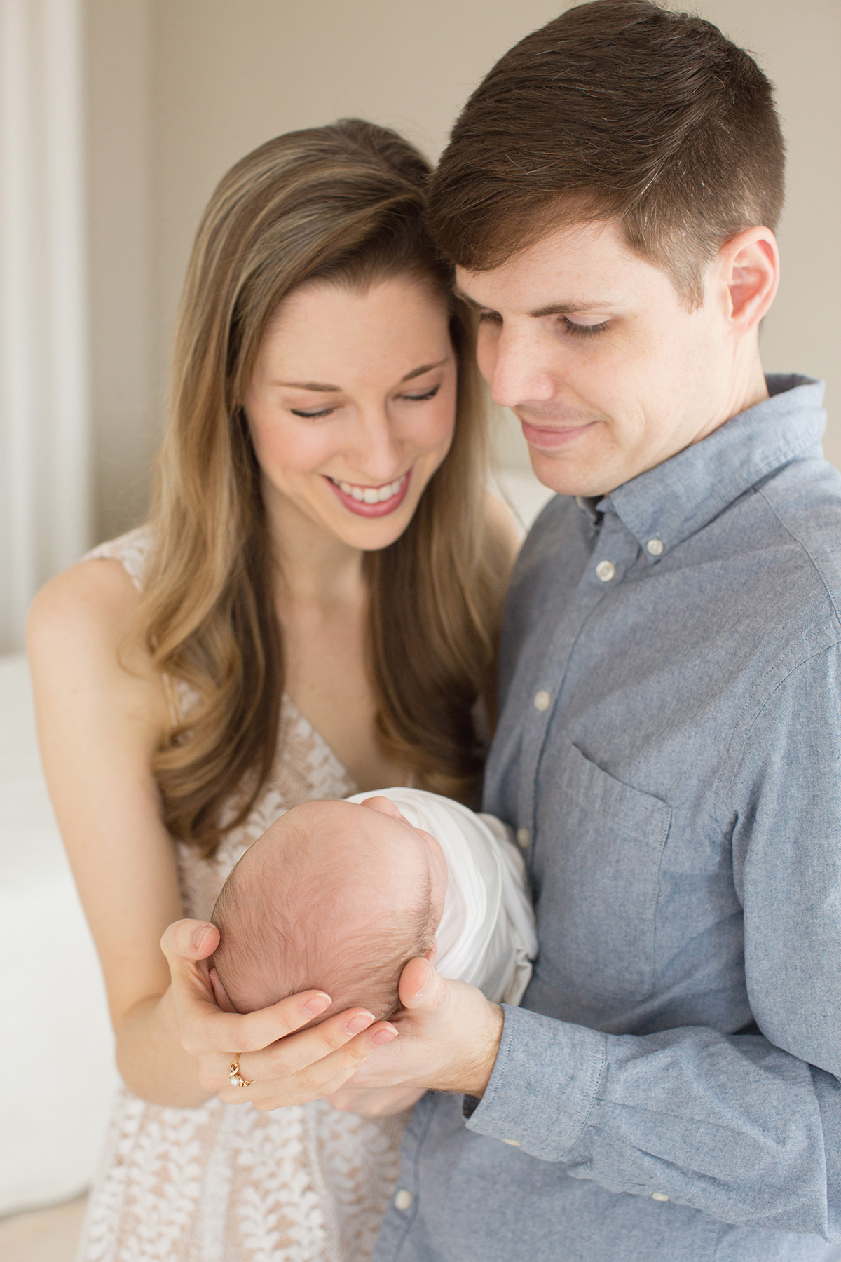 Louisville KY Newborn Photographer | Julie Brock Photography | Maternity Photographer Louisville | Mom and Dad pose with newborn.jpg