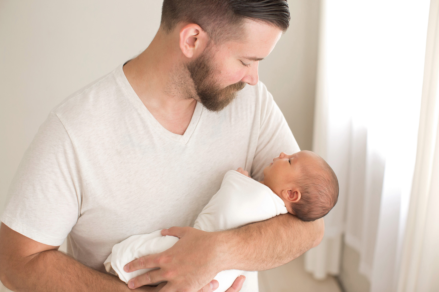 Louisville KY Newborn Photographer | Julie Brock Photography | Family Photographer | Maternity Photographer | dad with newborn baby in his arms for photo shoot.jpg