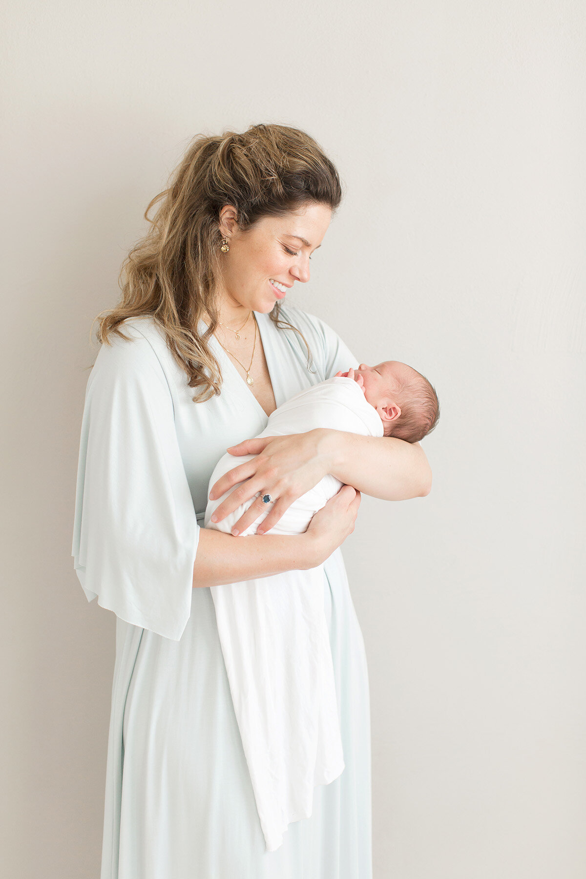 Julie Brock Photography | Louisville KY Newborn Photographer | Maternity Photographer | Family | Mom holding baby in perfect dress.jpg
