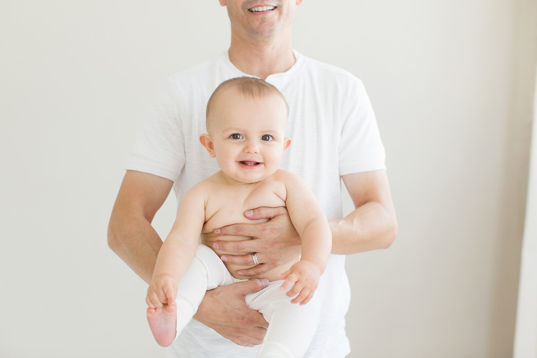 Dad holds 6 month old baby boy at Julie Brock Photography in Louisville KY