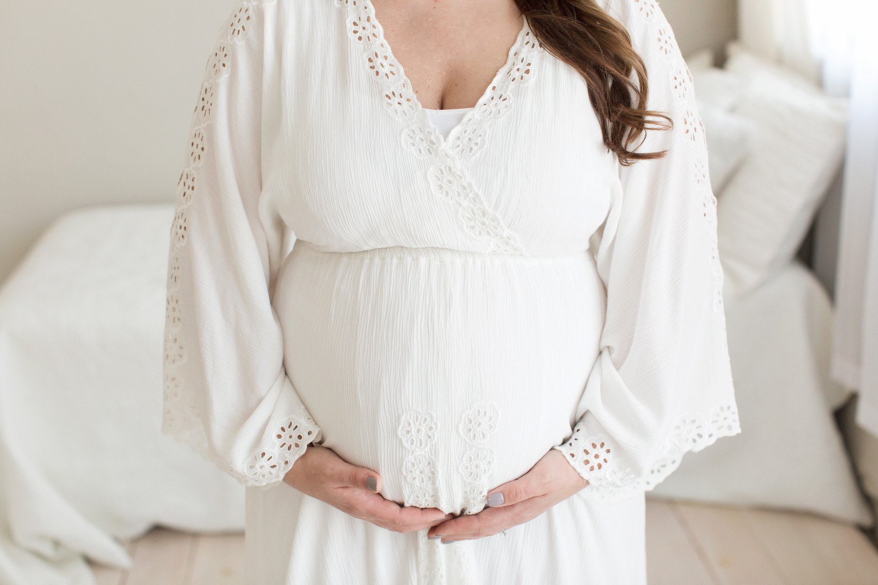 mom wears fillyboo white lace dress for pregnancy pictures with Julie Brock Photography in Louisville KY