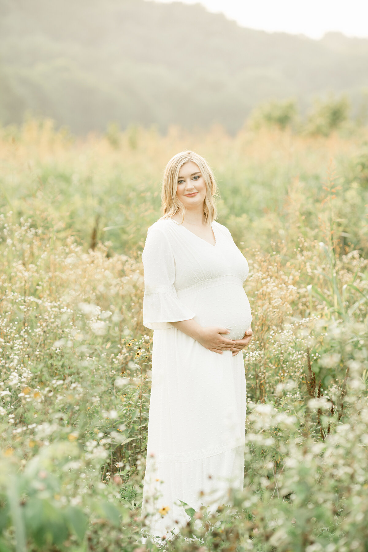 Boho maternity photo shoot in field with flowers. Perfect maternity photo shoot dress. Julie Brock Photography Louisville KY
