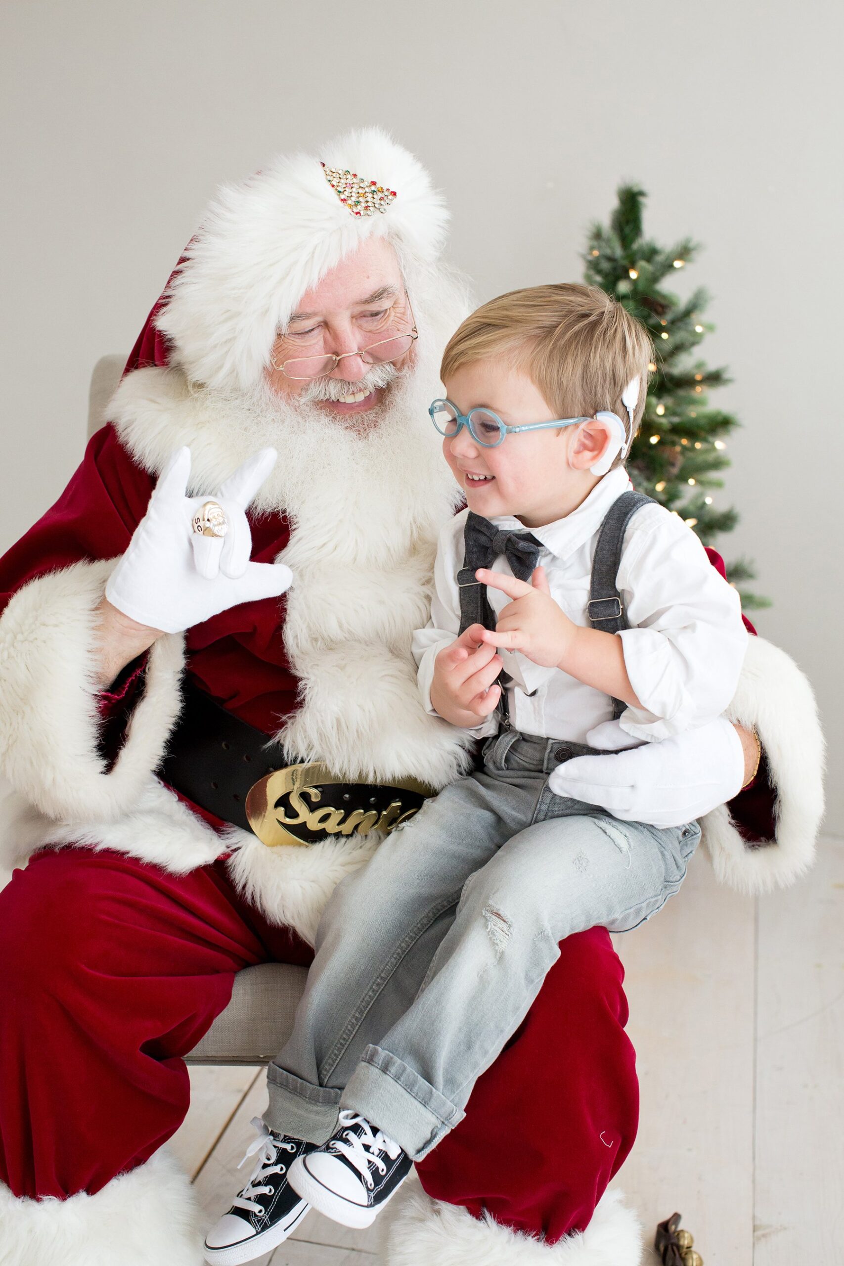 Santa signs I love you to boy at Julie Brock Photography in Louisville KY