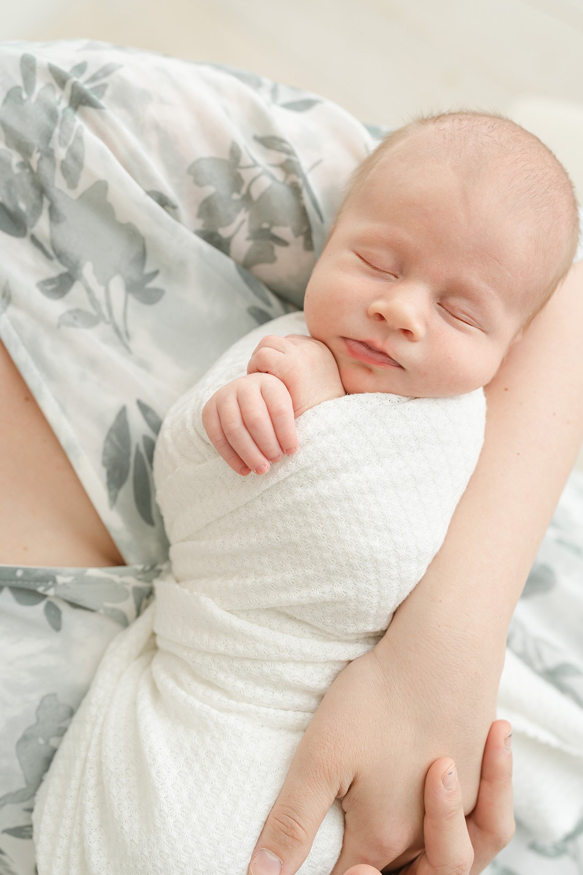 Julie Brock photographs newborn sleeping baby at Louisville KY studio