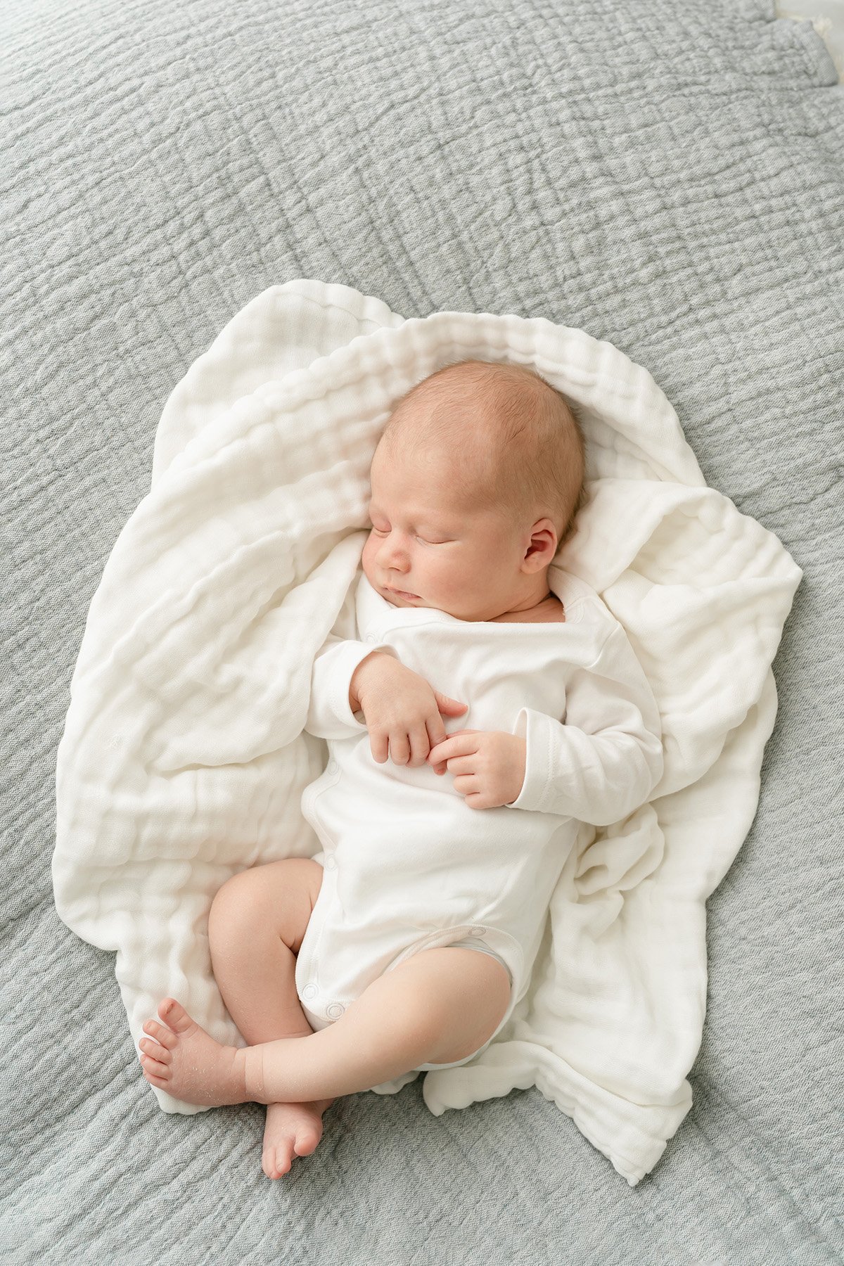 Newborn Baby relaxed posing in Louisville KY Julie Brock Photography studio