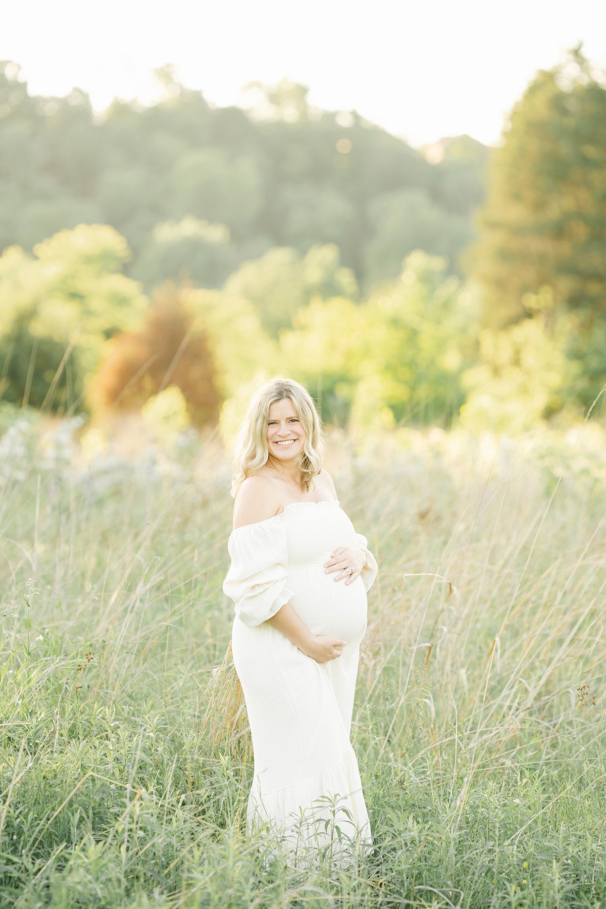 sunset pregnancy photo shoot in Louisville KY park with Julie Brock Photography