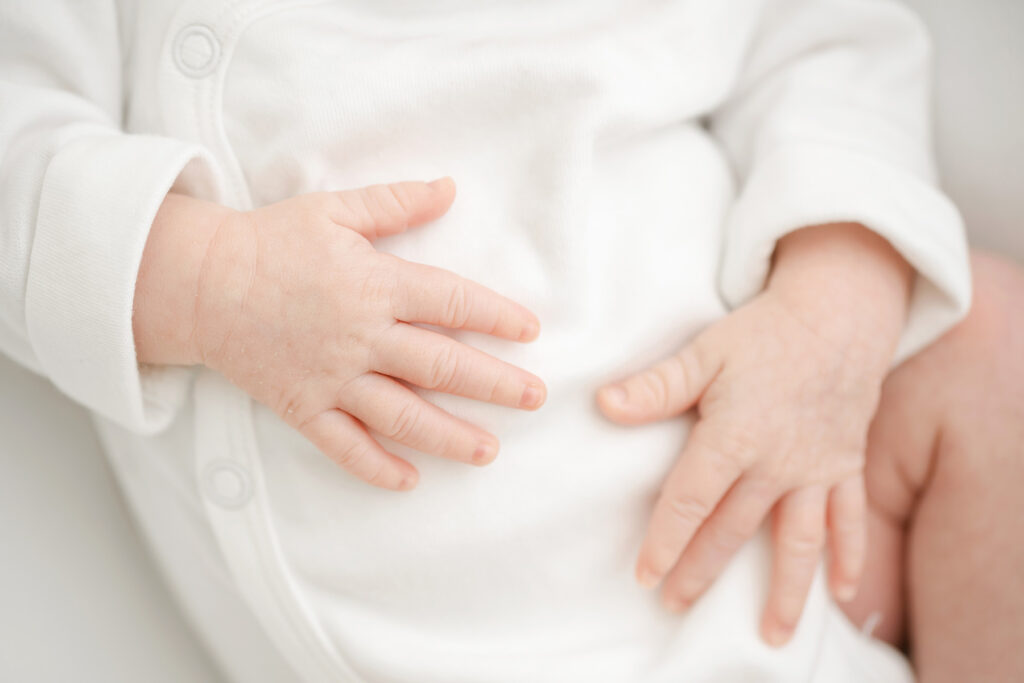Detail image of newborn baby hands at Julie Brock Photography in Louisville KY