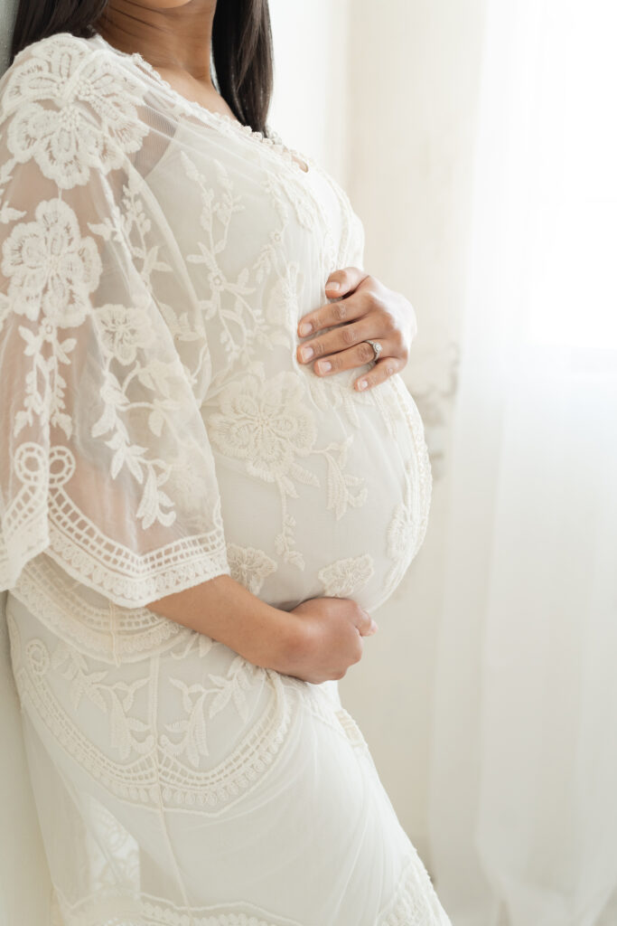 Mother wears dresses from Julie Brock Photography's wardrobe for her maternity pictures