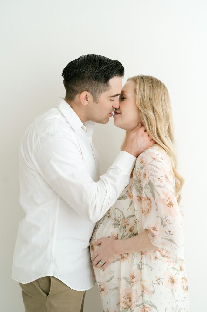 Dads wearing blue and white shirts for newborn photos