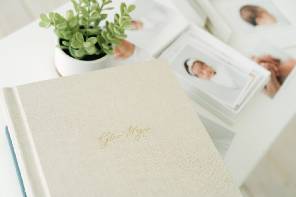 Louisville Photographer, Julie Brock, creates custom albums and artwork for families. She also provides clothing for moms to wear during photo sessions.