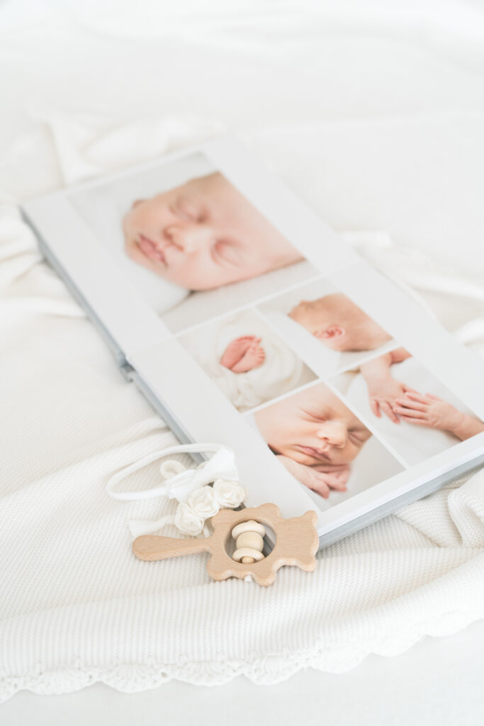 Newborn Photographer near Louisville Ky creates photo albums that families love